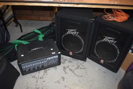 A Peavey XR560 powered mixer amp , pair of peavey speakers and poles