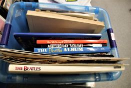 A large amount of Beatles and Wings related items with scrapbooks , fan club material , badges ,