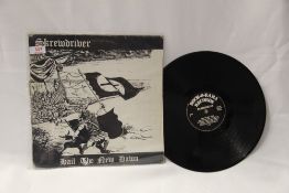 A long player by controversial UK street punk band ' Skrewdriver ' - KBD / Oi interest - these
