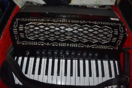 A Borsini midi accordion, model SL 4117M, in plush lined hard case