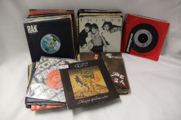 A lot of eighty unplayed seven inch singles - these were sourced from a record shop and have been