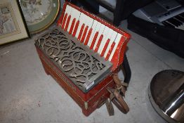 A tradition piano accordion, labelled Casali Verona, small proportions
