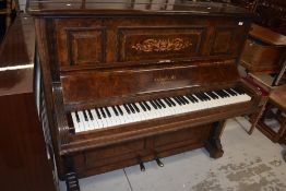 A 19th Century walnut cased upright piano, Chappel & Co , London and a later mahogany piano stool