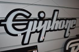 An Epiphone shop sign
