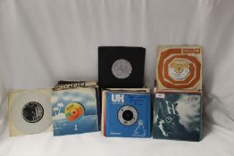 A lot of one hundred unplayed seven inch singles - these were sourced from a record shop and have
