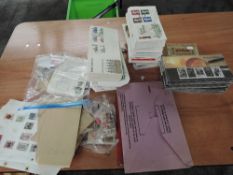 A box containing GB & World Stamps and Covers including Presentation Packs and part sheets