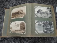 A vintage Postcard album containing approx 300 black & white and colour Postcards from around the