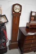 A 20th century grandmother clock having carved detailing to front and ornate beading.