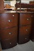 A pair of reproduction bow fronted filing cabinets