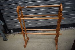 A rubber wood towel rail in the traditional style