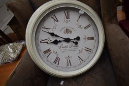 A reproduction kitchen wall clock