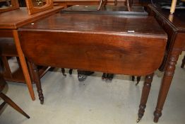 A Victorian mahogany pembroke style table