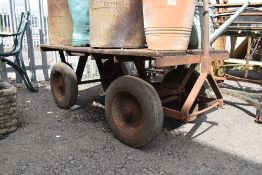 A railway or similar transport related platform cart or luggage trolly