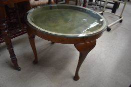 An early to mid 20th Century bijouterie style coffee table on Queen Anne style legs