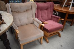 Two vintage oak framed chairs having dralon upholstery, being standard wing back and rocker