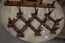 A 19th Century concertina hat rack