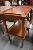 A teak tea trolley