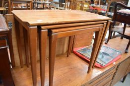 A teak nest of table