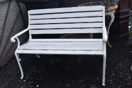 A modern garden bench with cast iron ends
