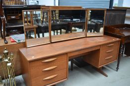 A vintage teak dressing table