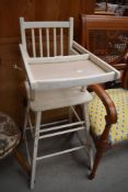 A vintage child's high/low chair, painted