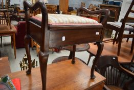 A traditional piano stool