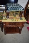 A traditional tapestry top sewing stool with lift top, and foot stool