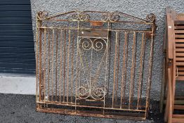 A pair of wrought iron drive way gates