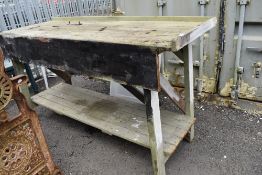 A vintage pine work bench or potting table