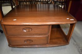 An Ercol mid colour Pandora style coffee table