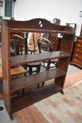 An Arts and Crafts bookshelf, in dark oak, width approx. 92cm
