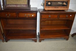 A pair of reproduction Regency low/hall book shelves