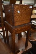 A mid 20th Century oak planter