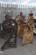 Two Victorian cast iron partial mangles both good for garden features