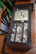 An early 20th Century oak cased wall clock