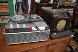 A vintage Bush DAC90A bakelite radio and a Philips reel to reel