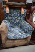 A vintage moquette armchair