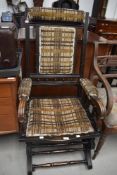 A 19th Century stained frame American rocking chair