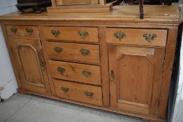 A stripped pine dresser base/sideboard, width approx. 163cm