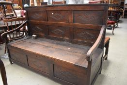 A large period oak box settle/pew, width approx 160cm