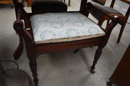 A late Victorian mahogany piano stool