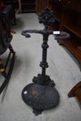 A reproduction cast stick stand