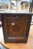 A Victorian mahogany coal purdonium