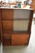 A vintage teak bookcase with cupboard under, nice proportions, width approx. 76cm