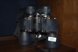 A pair of IR binoculars , with soft case and manual
