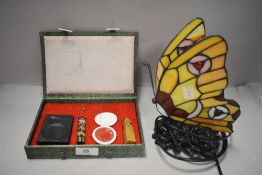 A leaded light style lamp of a butterfly with Chinese seal stamp set
