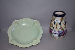 A Mettlach style vase having foliate decoration on matt ground, marks to base Made in Germany and