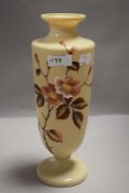A Victorian Aesthetic Period glass vase, of elongated urn form decorated with flowers against the