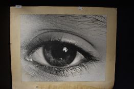 A mid century large photographic print of a female eye