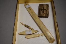 A selection of hornworks and a carved stone bible